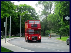 Big Bus passing by Queens Park